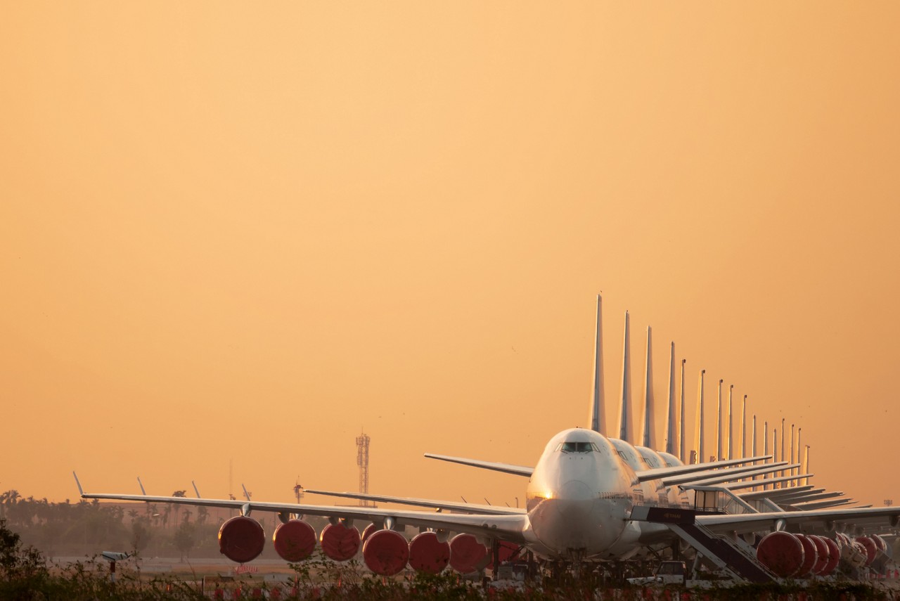 So many airplanes are in line on the runway waiting for take off.These Air Force planes are part of Operation stop service to transport in Covid-19 situation.